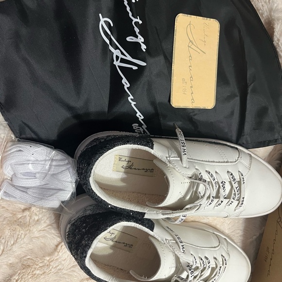 Buckle Shoes - White and Black Sneakers by Vintage Havanah